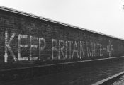 Racist grafitti on a brick wall, 1957-60, photograph by Henry Grant